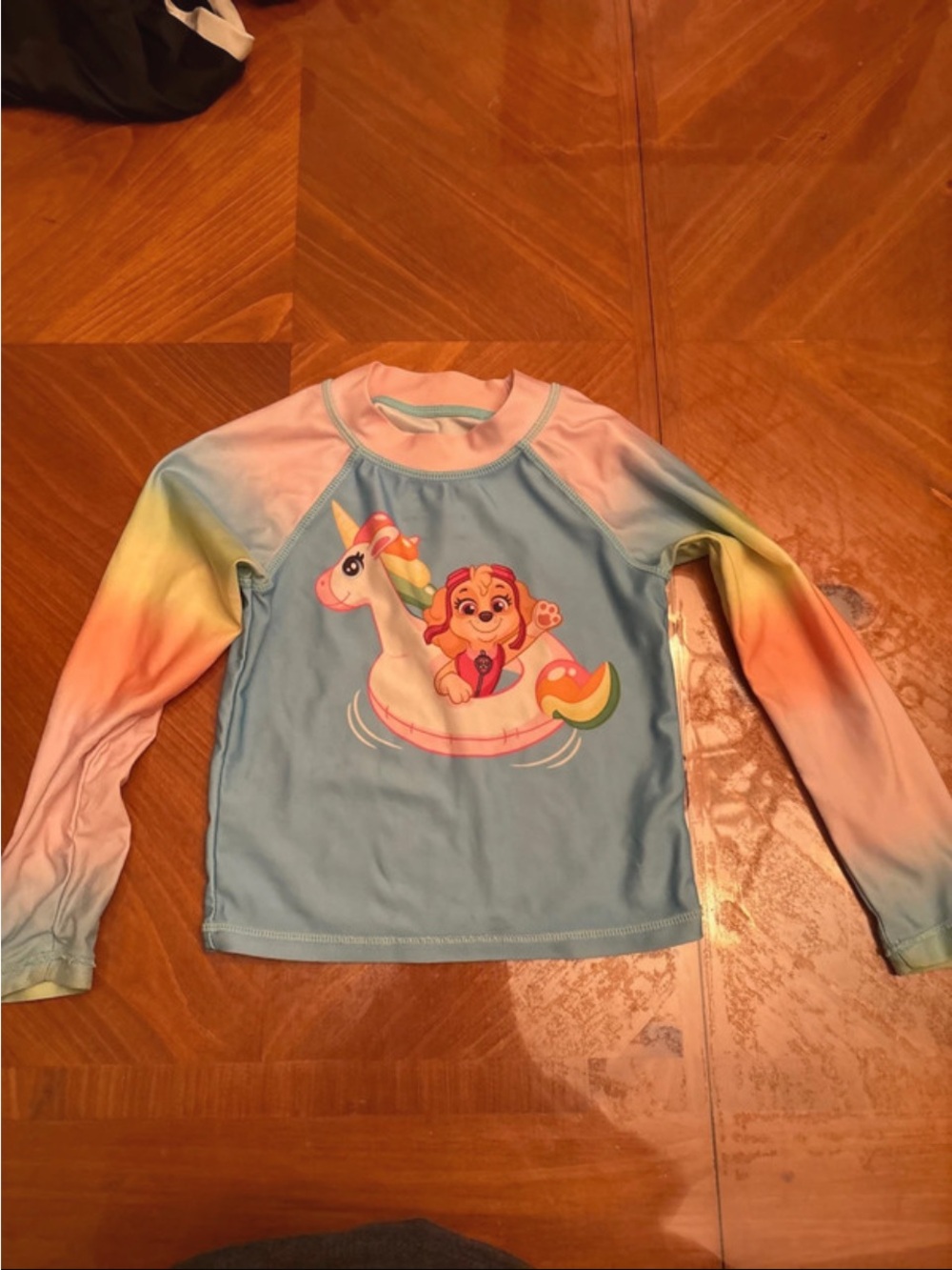 Paw Patrol Girls' Light Blue Rash Guard with Pastel Rainbow Sleeves